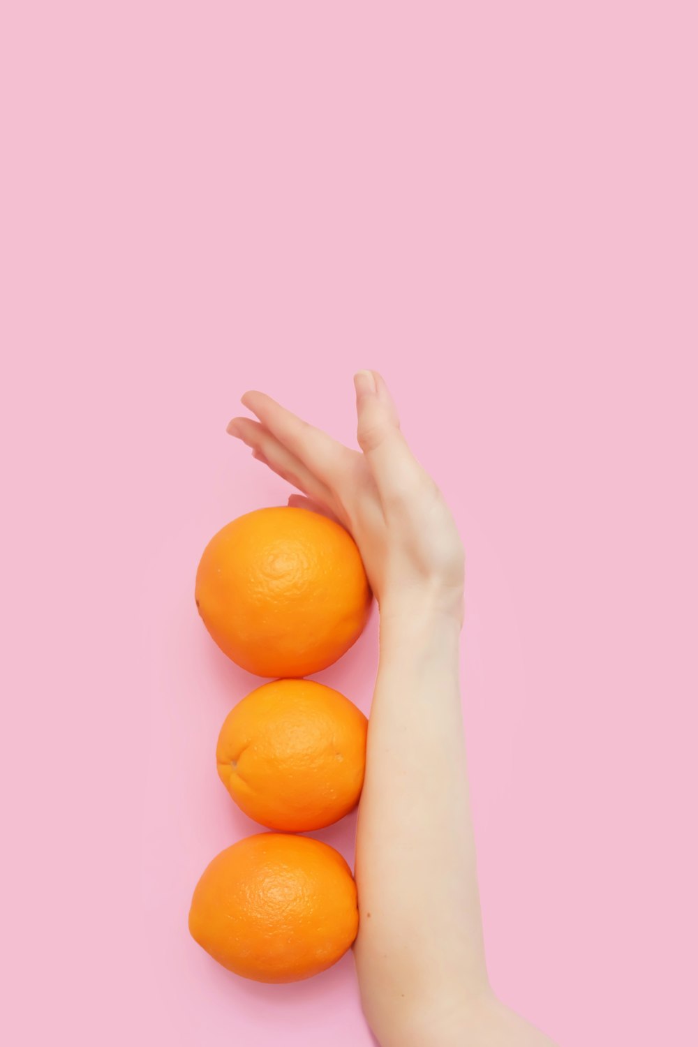 three round orange fruits