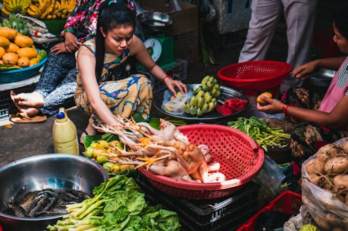 A vibrant market scene showing fresh ingredients that inspire our unique chicken skin recipes.