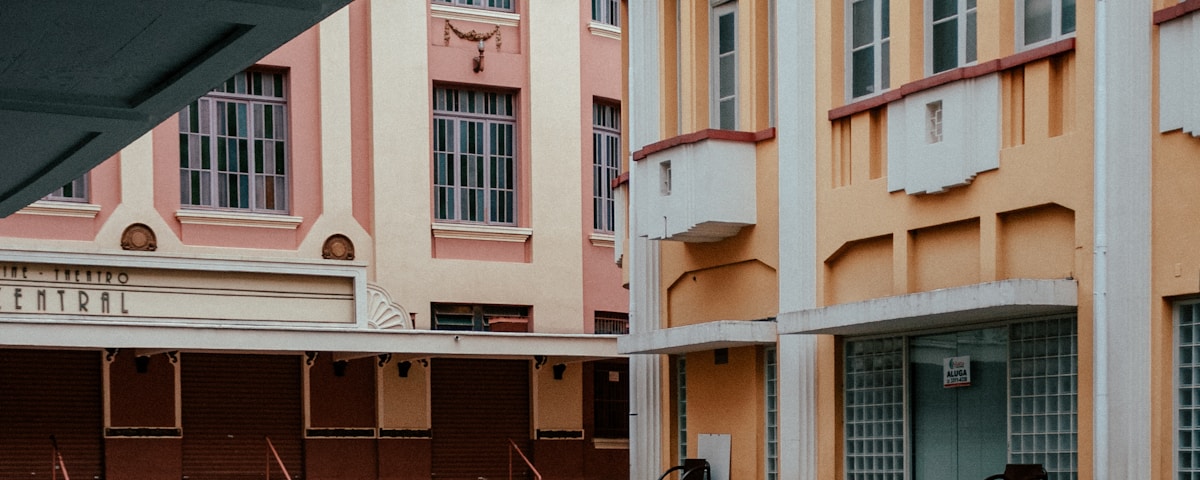 orange and white concrete building during daytime