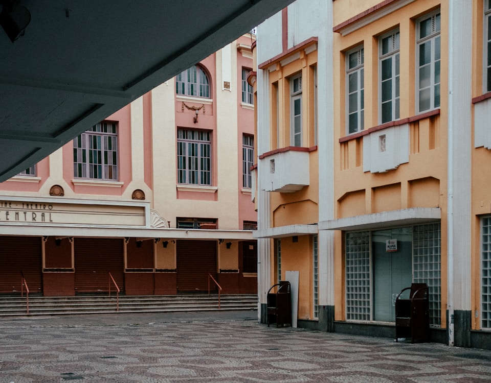 orange and white concrete building during daytime