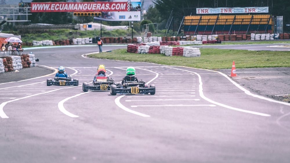 man riding go-karts in race track