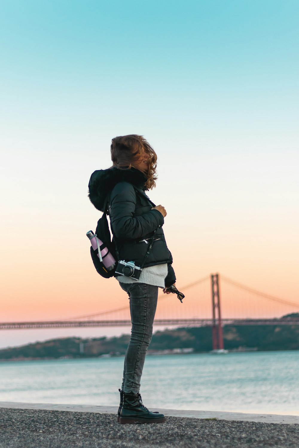 woman standing near ocean