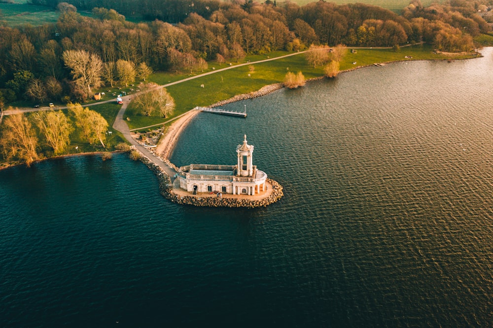 aerial photo of house on island surrounded with body of water