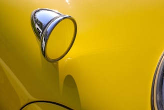 Side view of a shiny car with a perfectly smoothed-out door after dent repair.