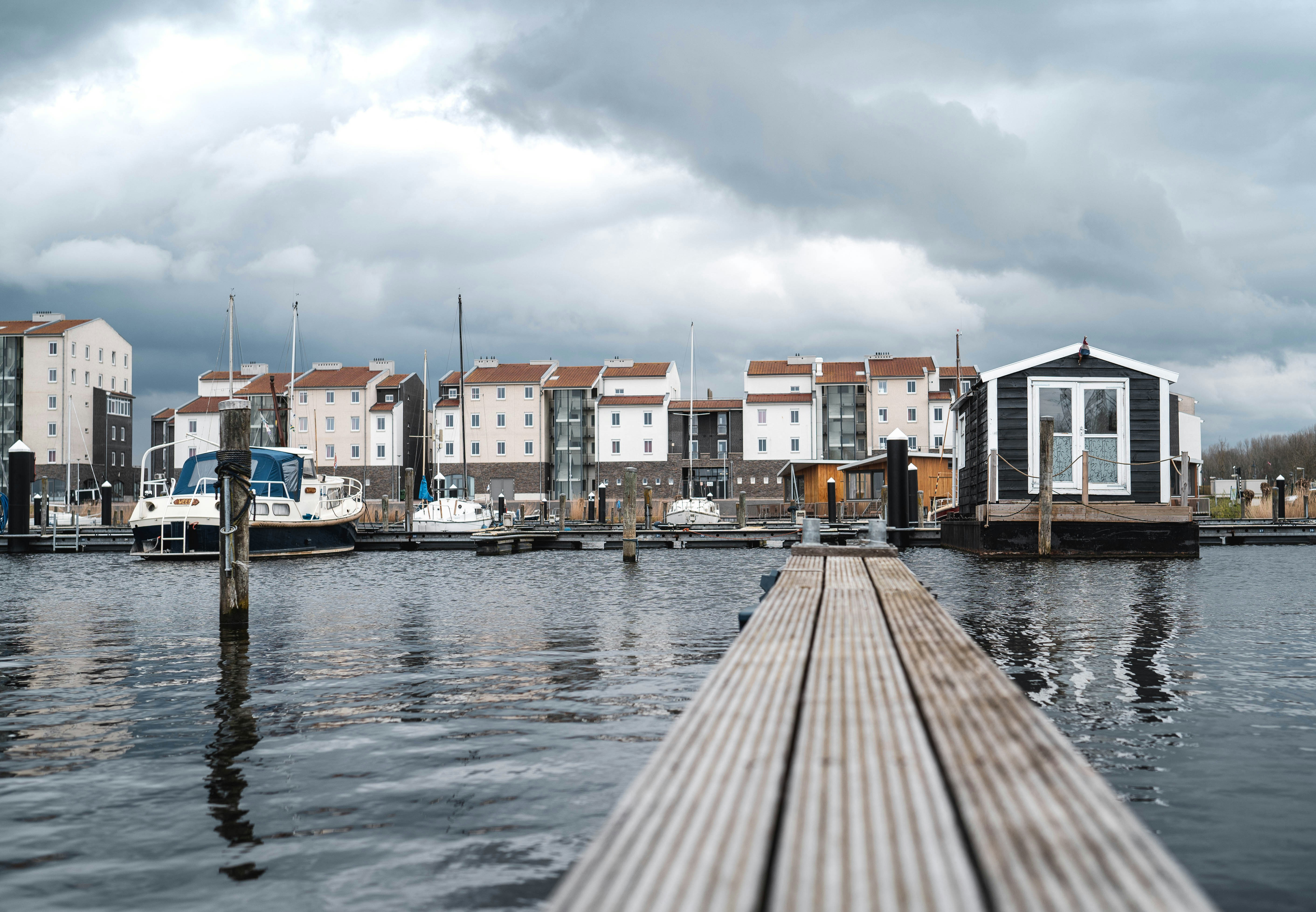concrete houses beside river