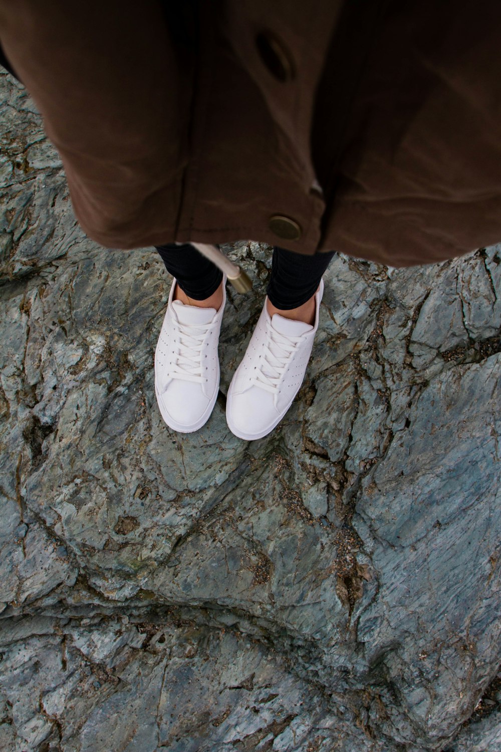 person wearing white shoes