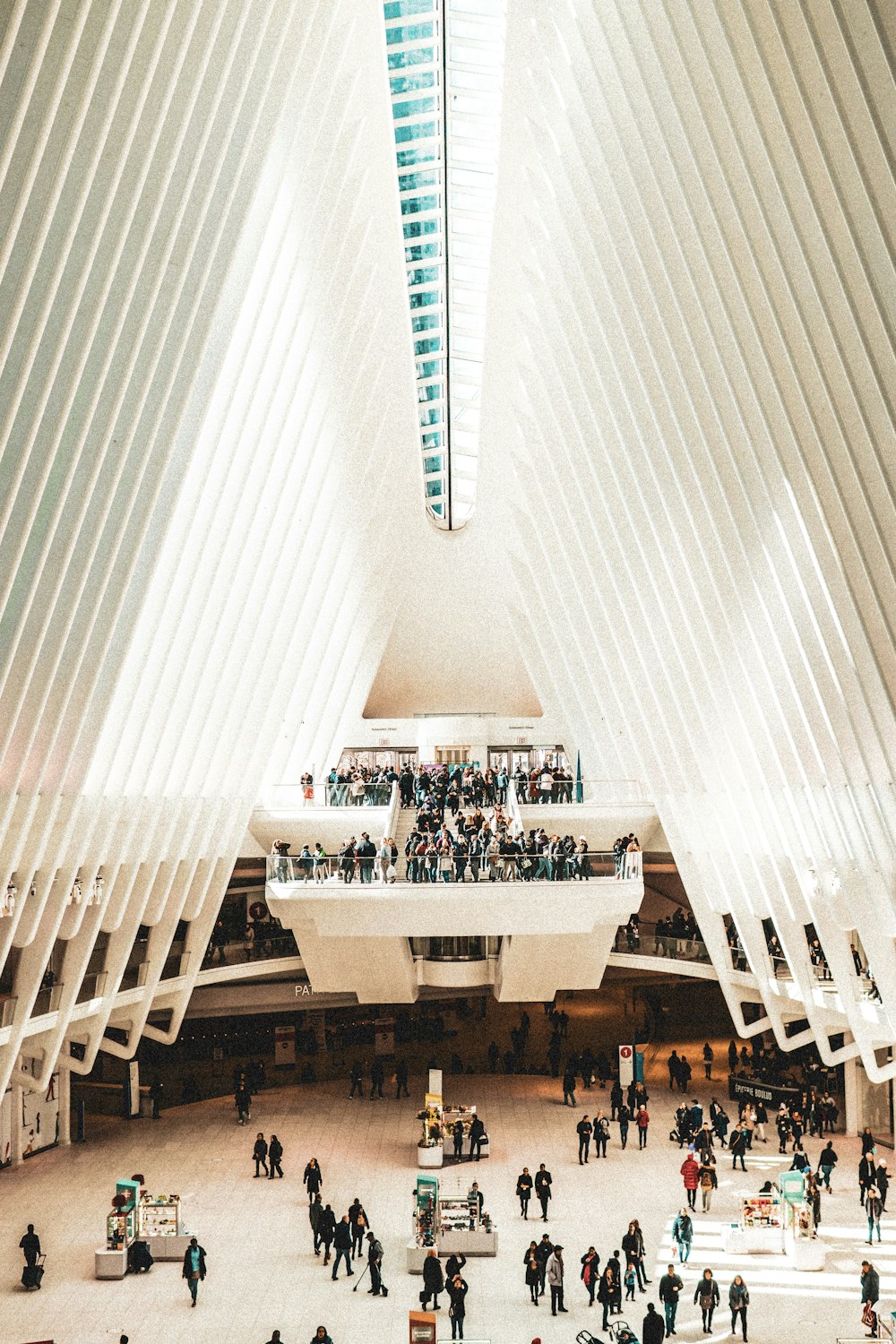 people in well-lit building