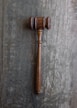 brown mallet on gray wooden surface