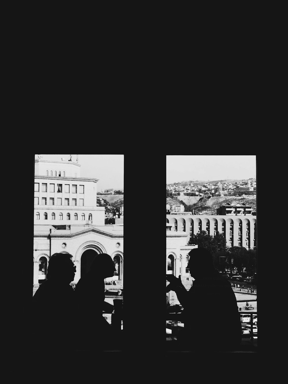 silhouette of people inside building