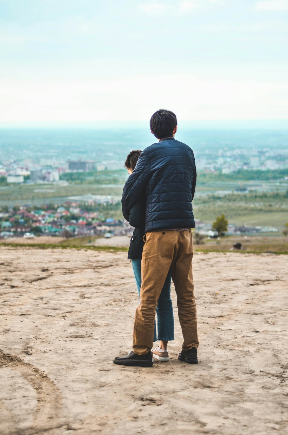 man hugging the woman