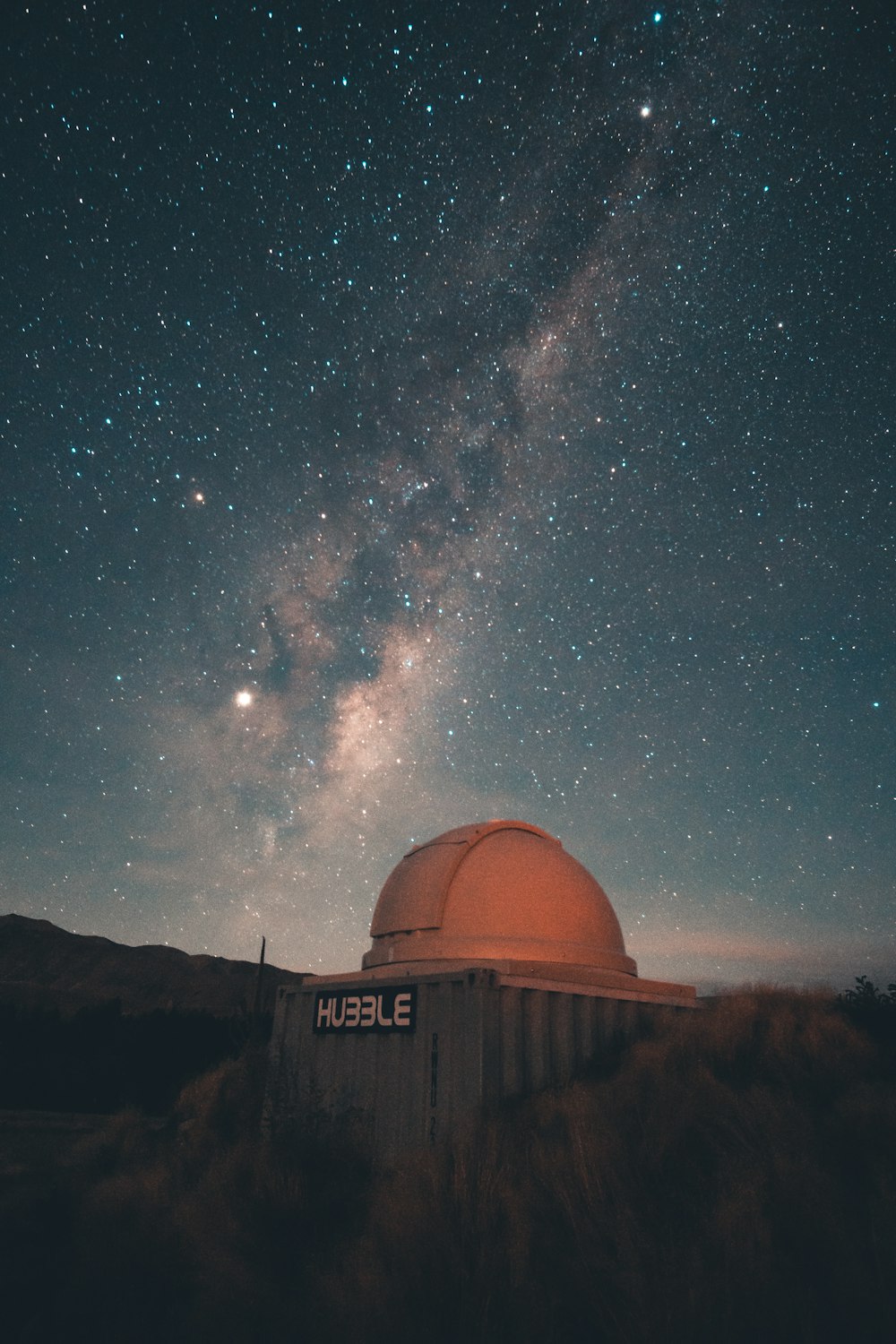 gray concrete building under starry night