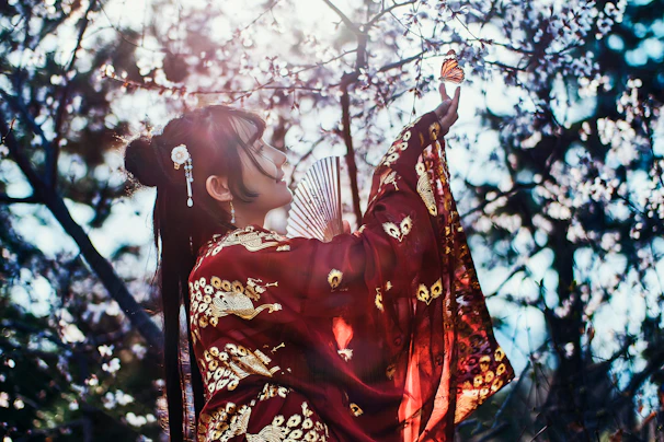 An artistic depiction of Manmatha wielding his sugarcane bow under a blooming spring tree.