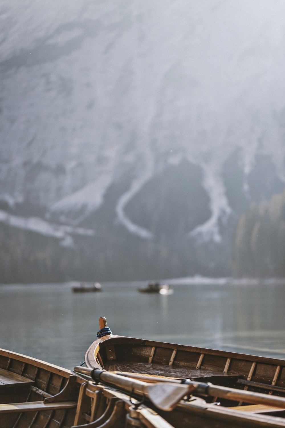 two brown boats on body of water