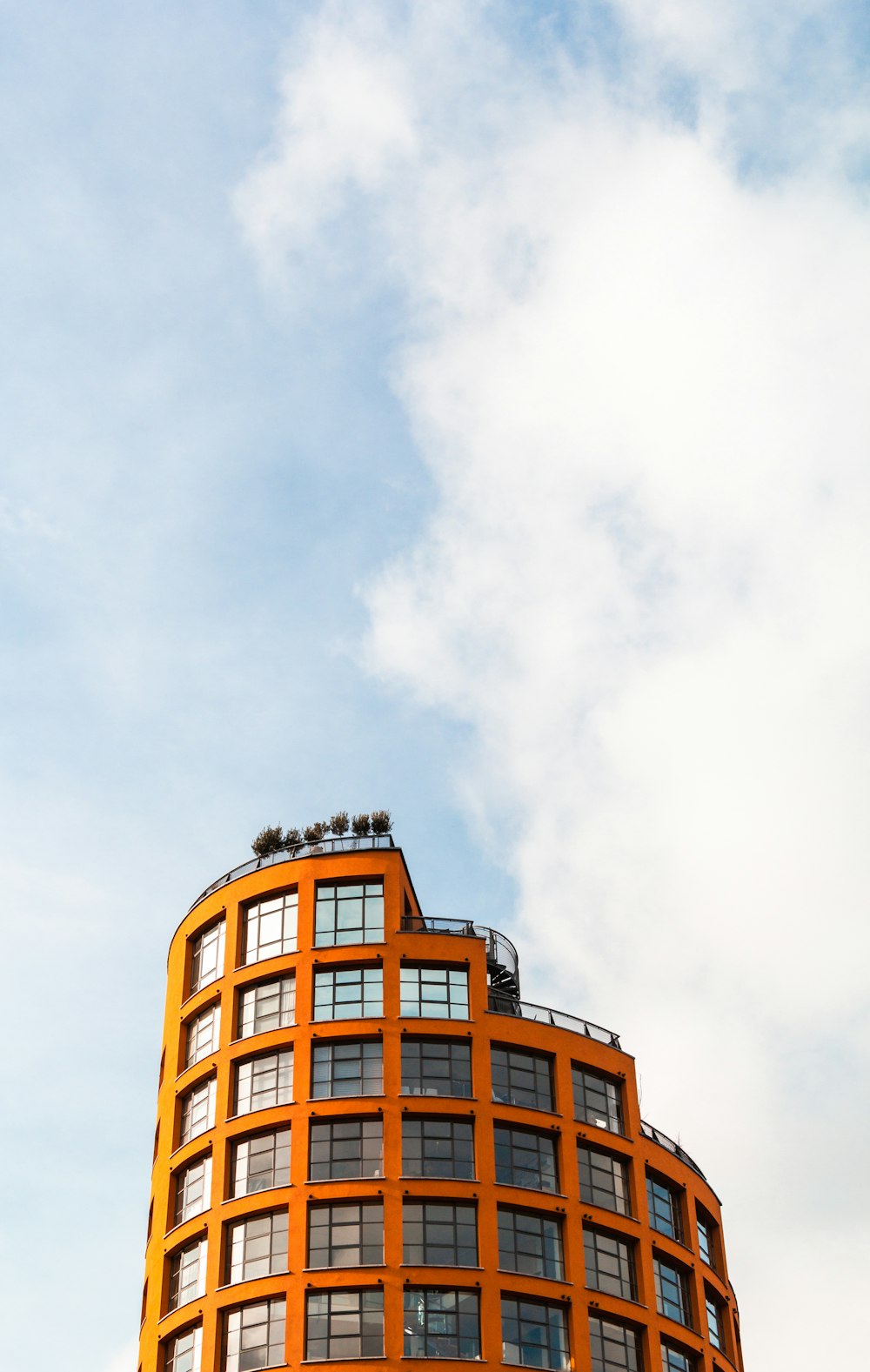 orange and clear curtain building during day time