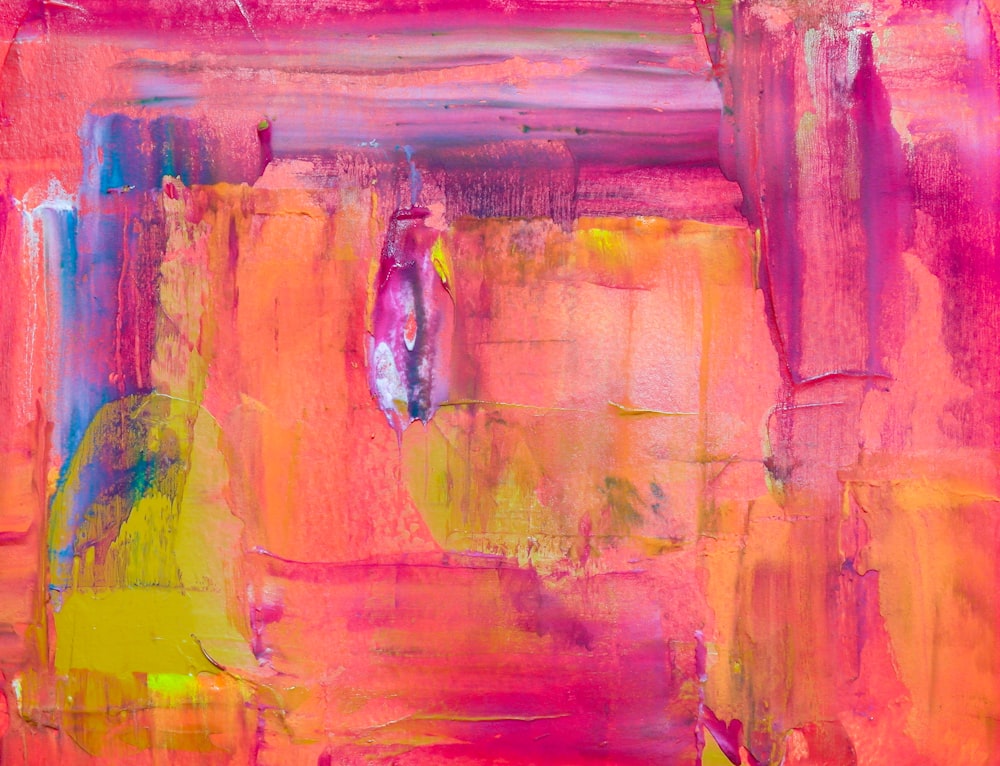 an abstract painting of pink and yellow colors