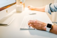 person using iMac