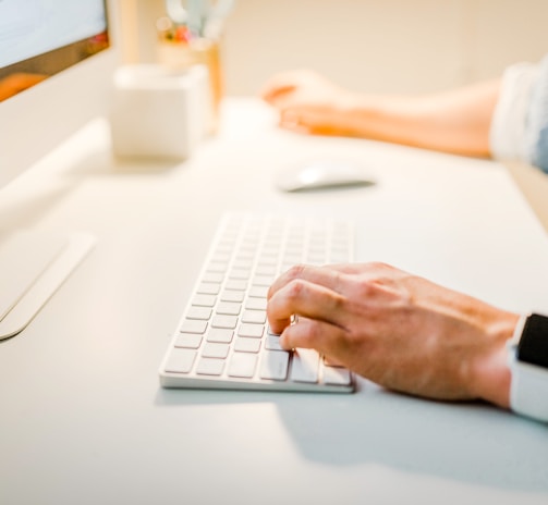 person using iMac