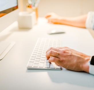 person using iMac