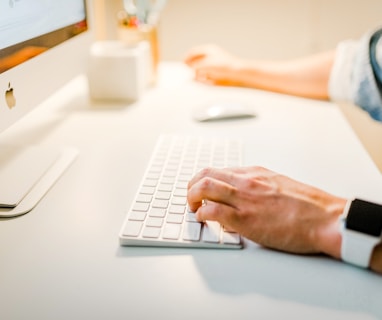 person using iMac