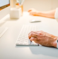 person using iMac