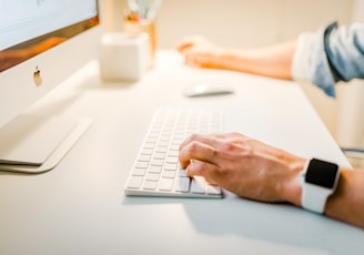 person using iMac