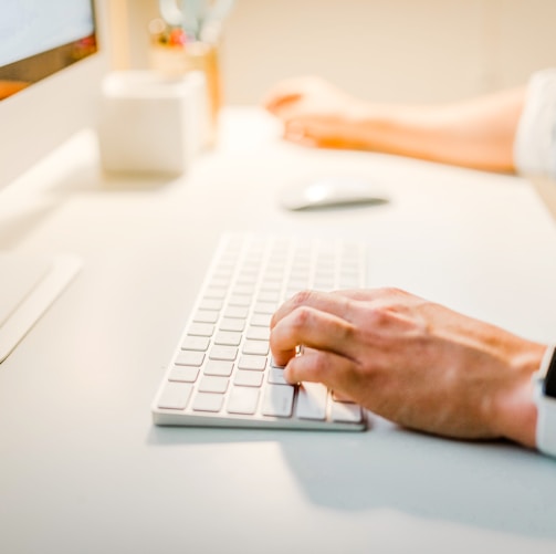 person using iMac