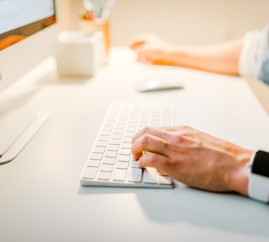 person using iMac