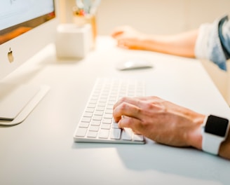 person using iMac