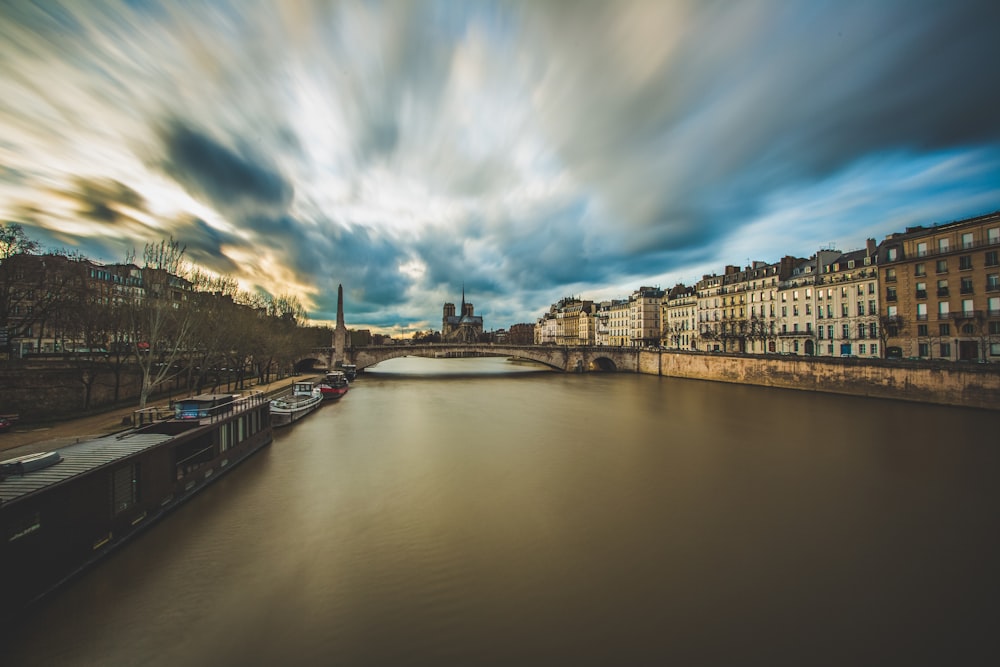 time lapse photography of bridge and canal