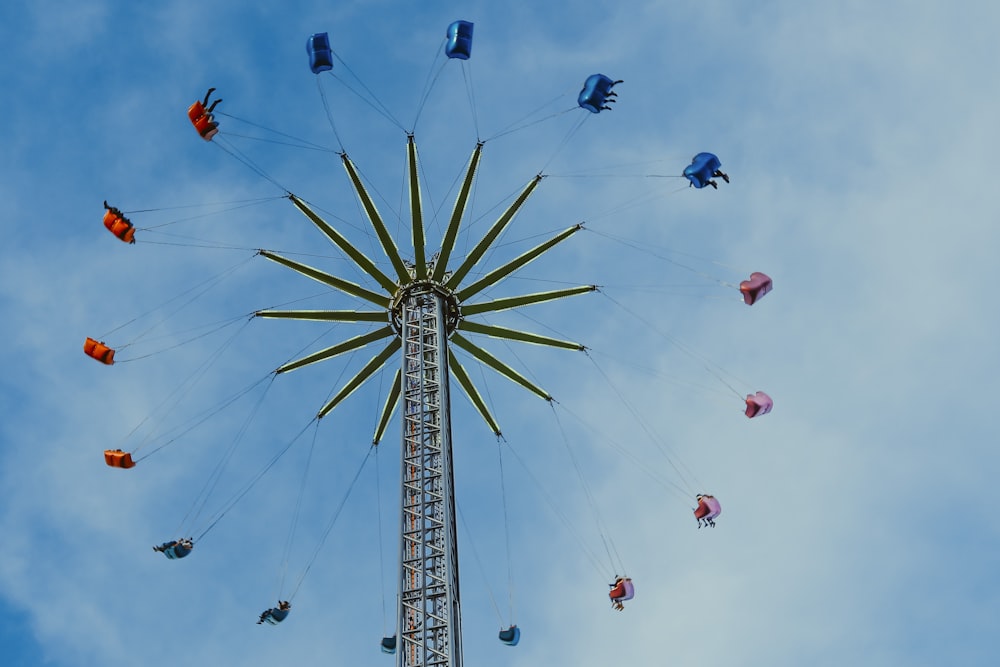 group of people amusement park rides