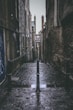 empty pathway surrounded by buildings