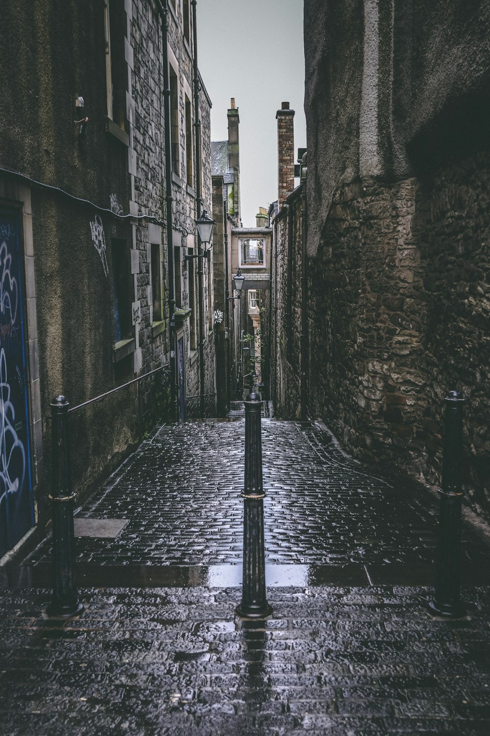 empty pathway surrounded by buildings