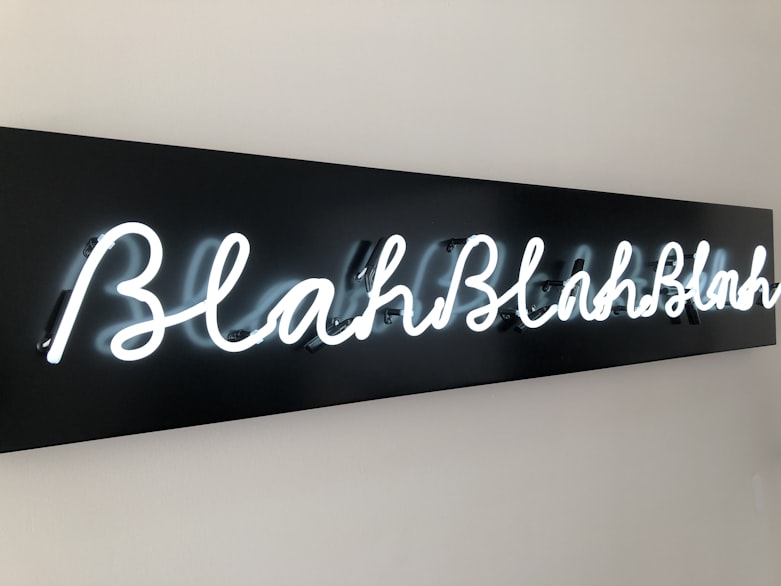 neon light mounted on white surface