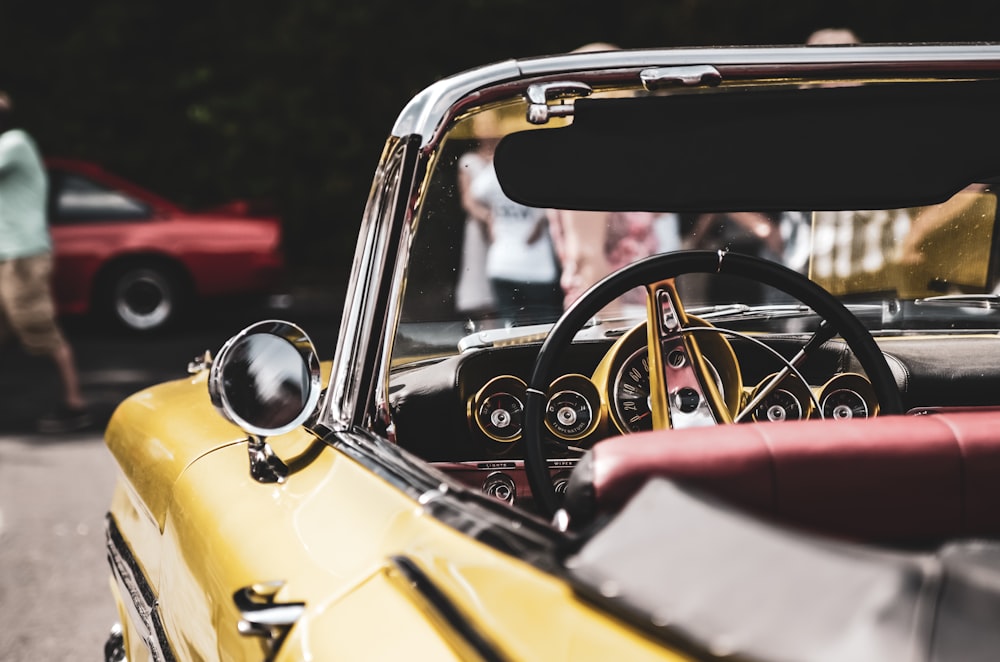 closeup photography of yellow coupe