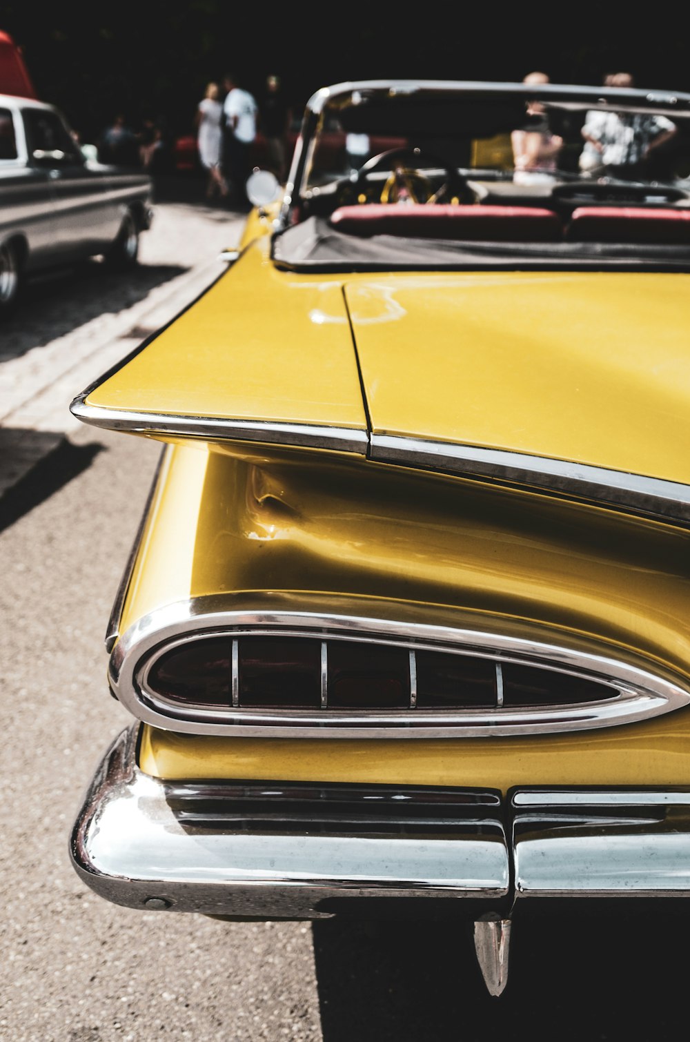 yellow convertible coupe