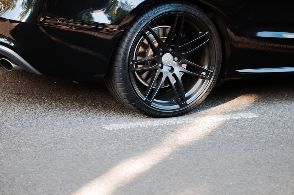 black multi-spoke vehicle wheel