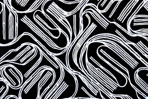 a black and white background with white lines