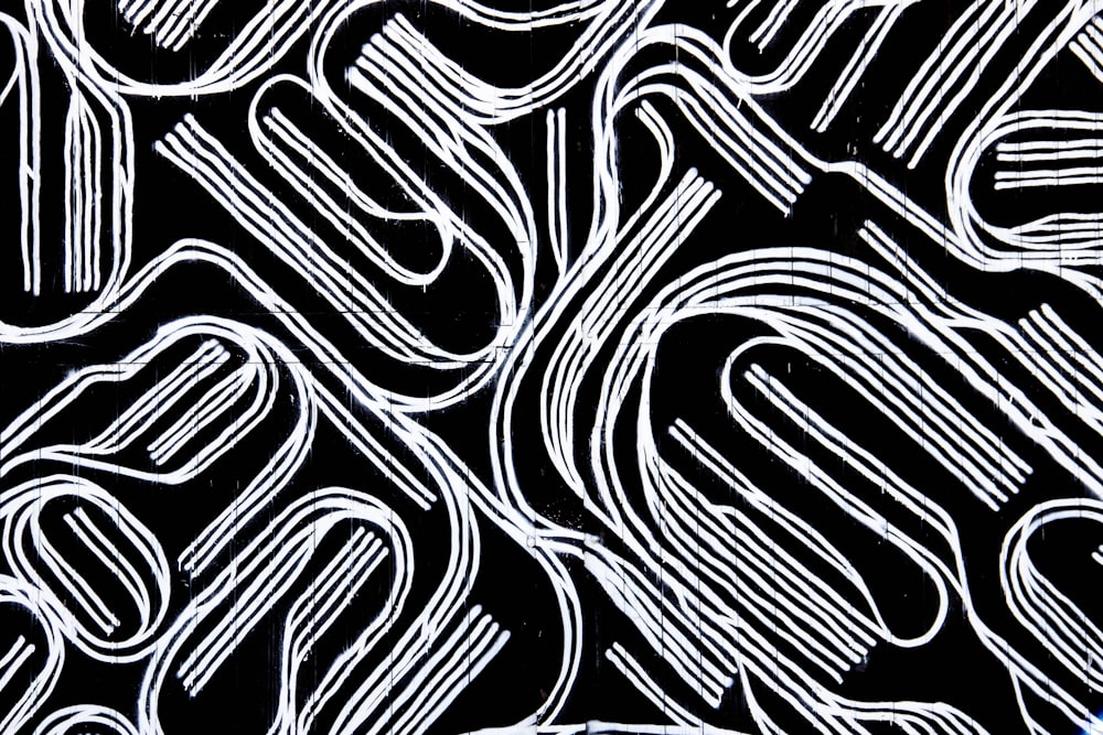 a black and white background with white lines