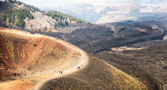 people walking at the valley in Mount Etna Italy