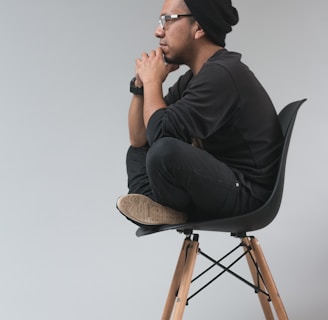 man sitting on chair