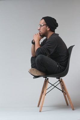 man sitting on chair