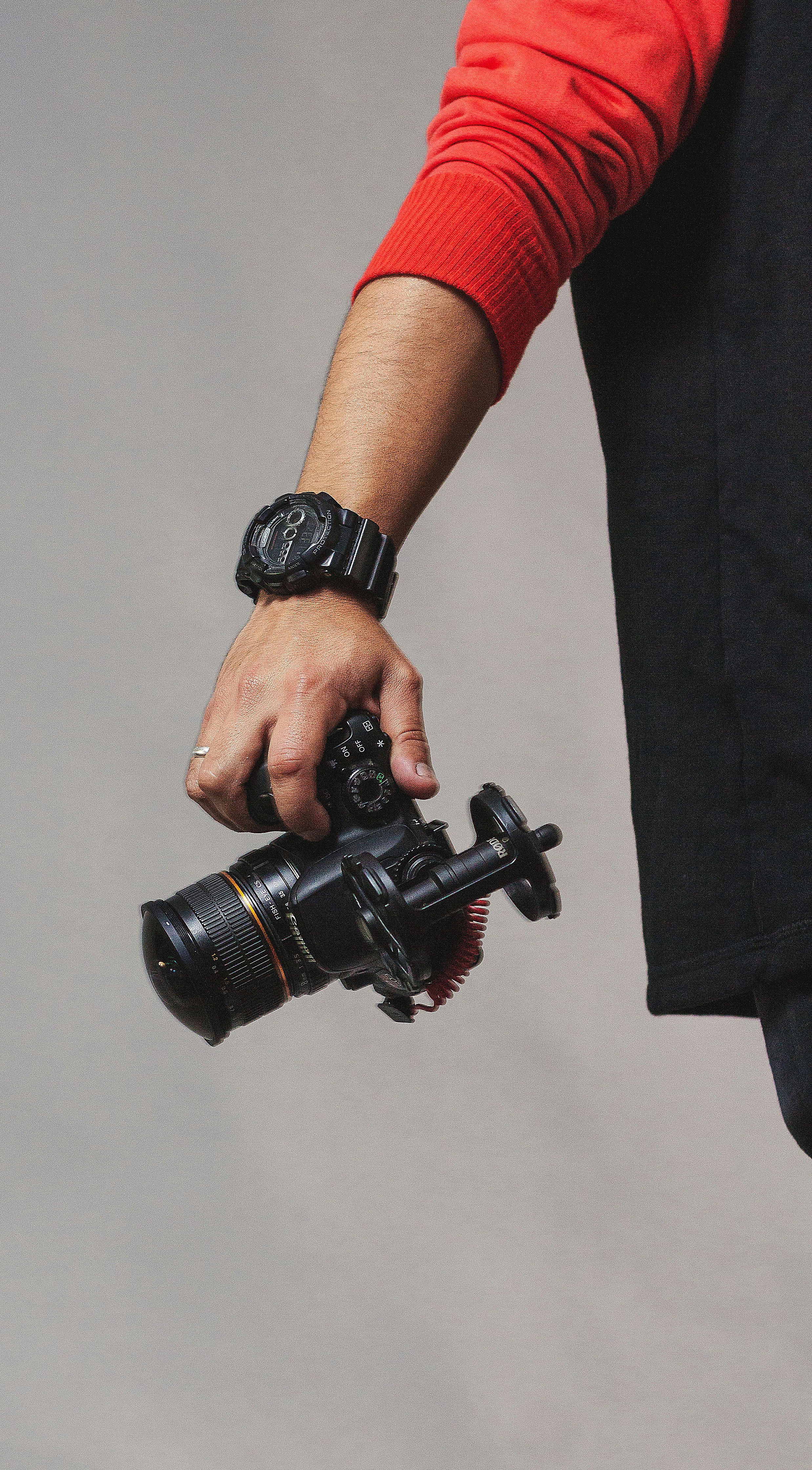 person holding black camera