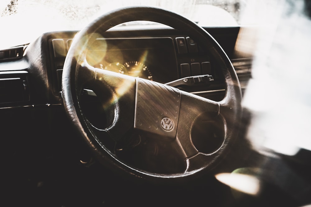 black Volkswagen steering wheel