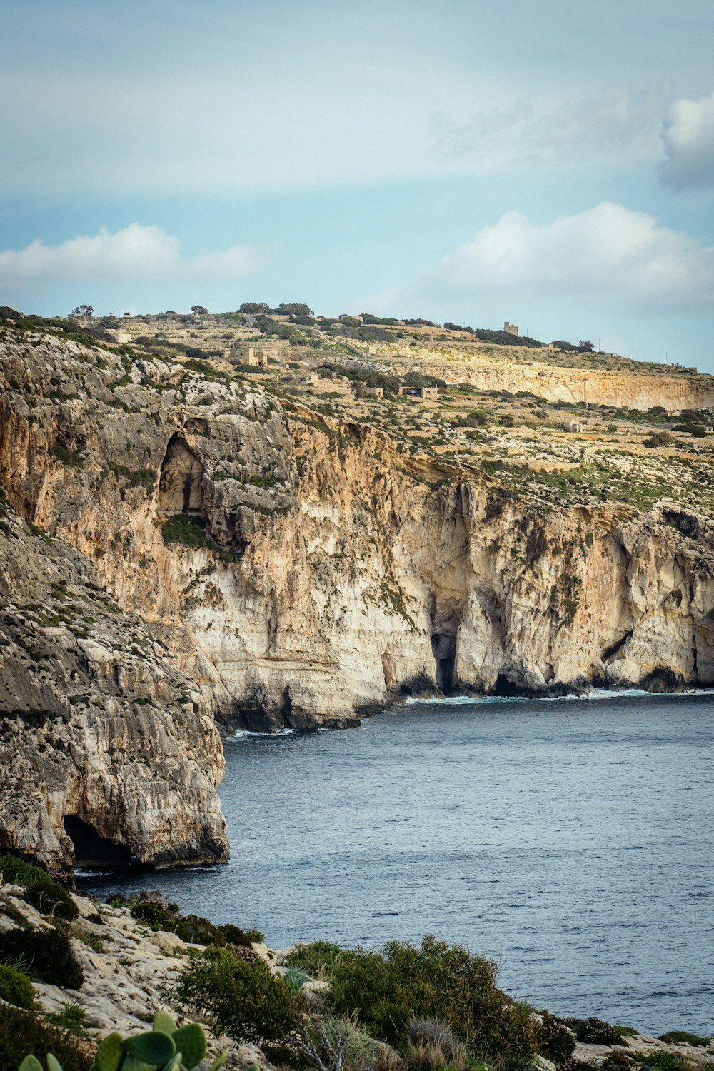 cliff near sea during daytime