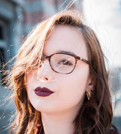 woman wearing black eyeglasses