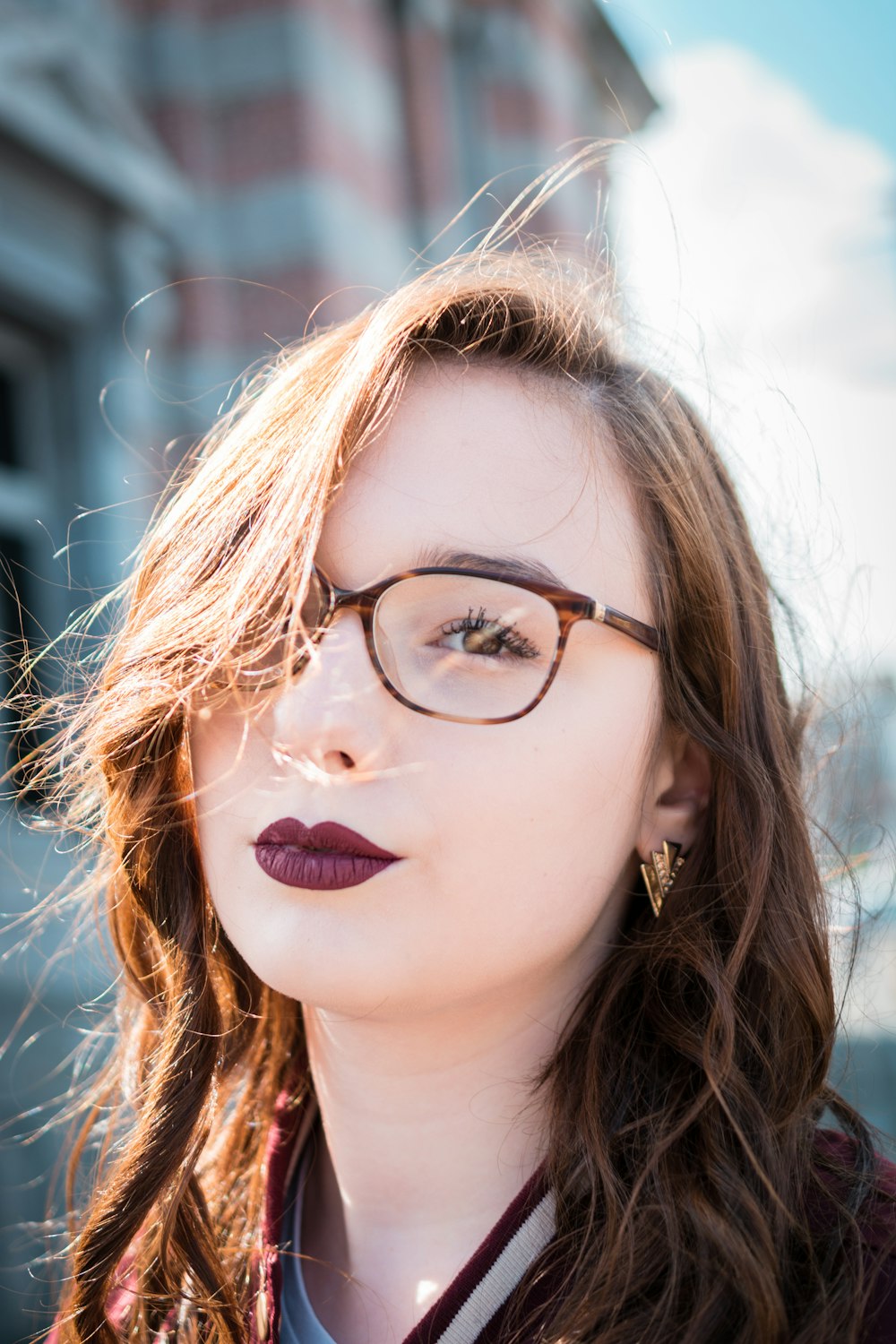 woman wearing black eyeglasses