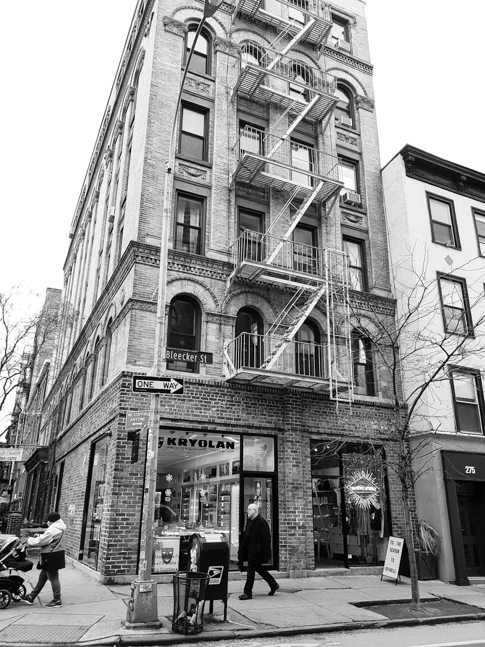 grayscale low angle photography of concrete building