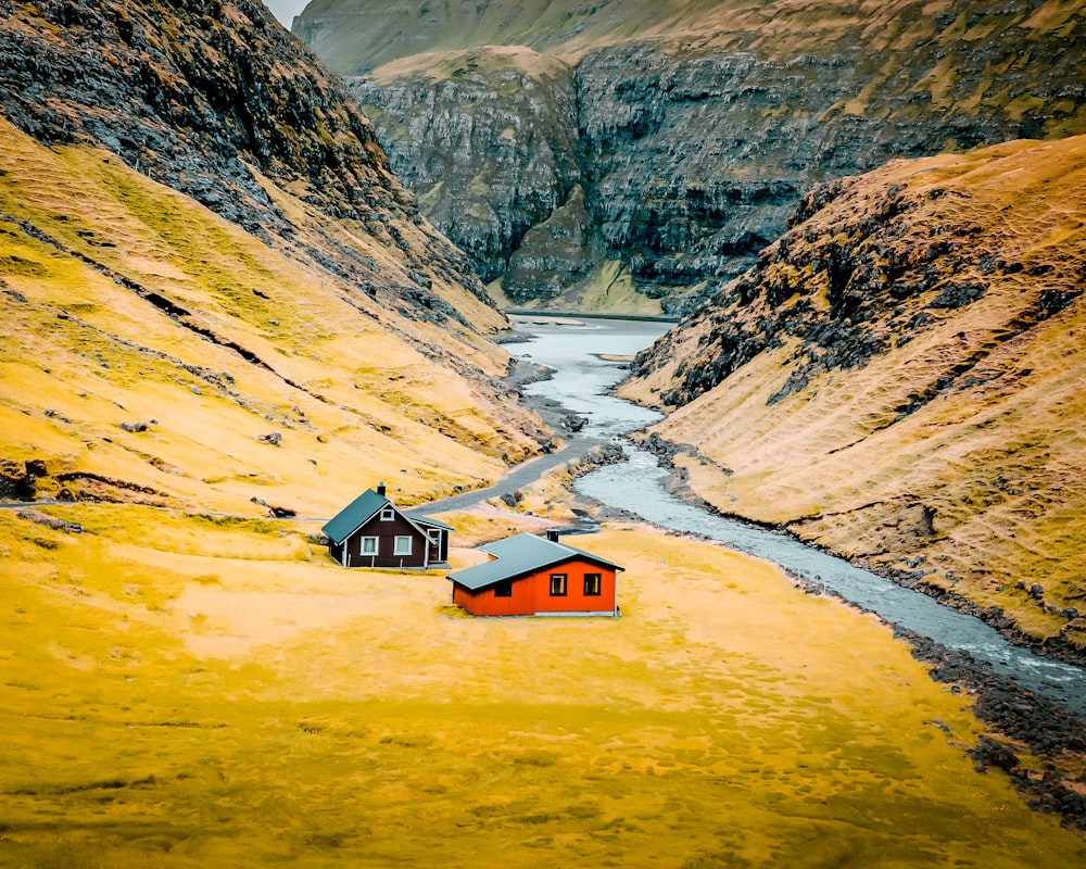 two house near mountain during daytime