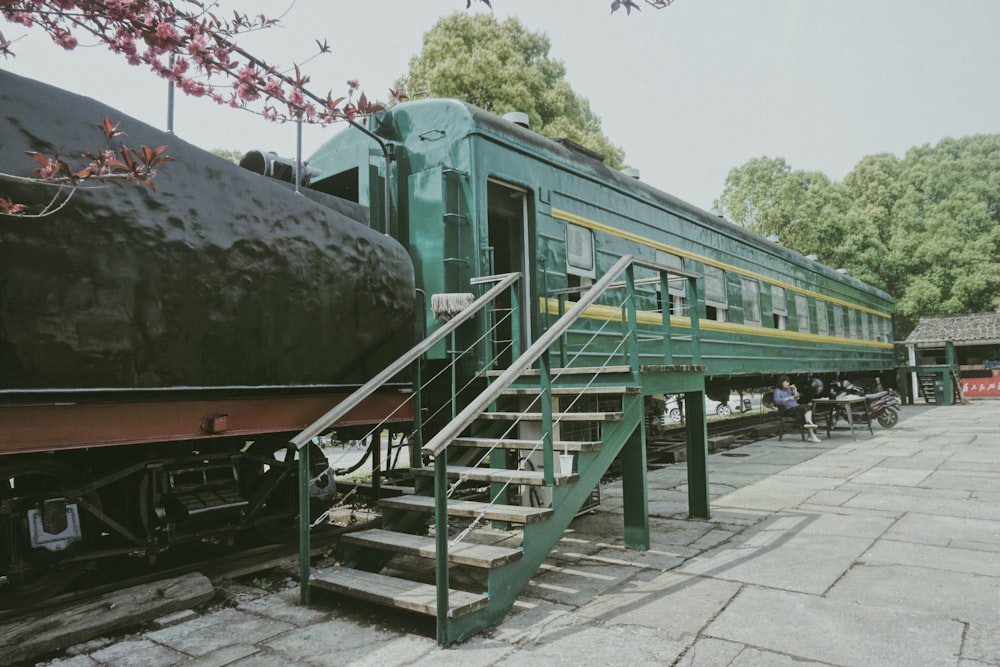 green train car during daytime