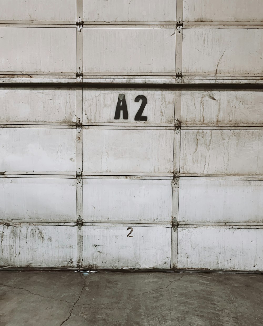 a garage door with the number a2 painted on it